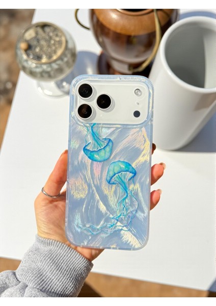 iPhone 17 Pro Uyumlu Deniz Anası Desenli Tüylü Hologramlı Silikon Kılıf indirimleri