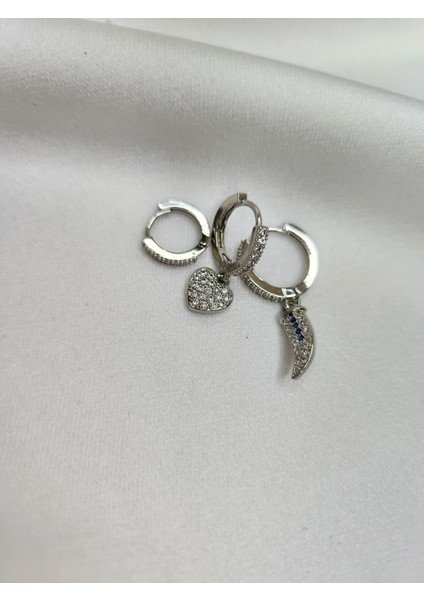 - Zirkon Taşlı Kalp Detaylı Çelik Küpe fiyatları