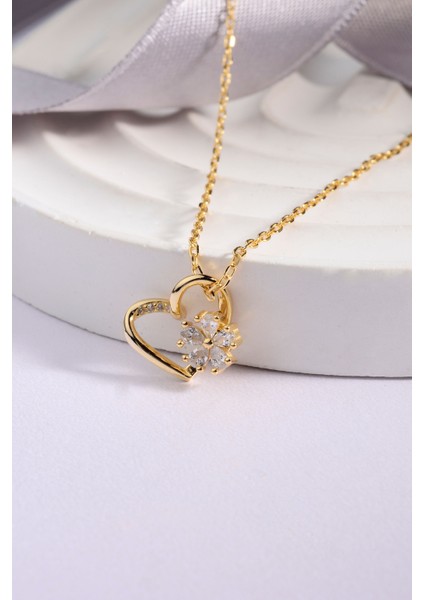 Altın Kaplama 925 Ayar Gümüş Hareketli Dönen Çiçek Taşlı Kalp Motifli Kolye fiyatları