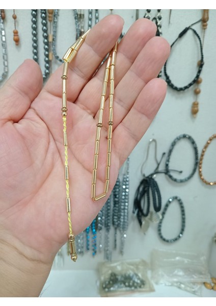 Kesme Model Altın Renk Hematit Taşı Tesbih 3 x 9 mm fiyatları