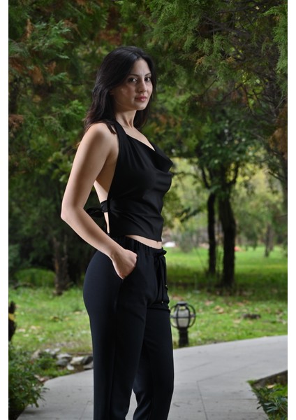 Paçası Yırtmaçlı,beli Lastikli ve Kordon Detaylı,havuç Kesim Pantolon