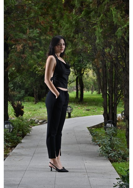 Paçası Yırtmaçlı,beli Lastikli ve Kordon Detaylı,havuç Kesim Pantolon