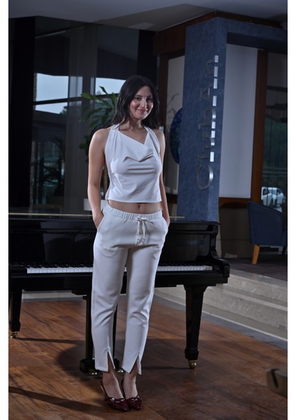 Paçası Yırtmaçlı,beli Lastikli ve Kordon Detaylı Havuç Kesim Pantolon fırsatları