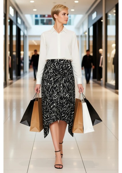 Kadın Yüksek Bel Midi Boy Asimetrik Volanlı Skater Kesim Zebra Desenli Örme Kaşkorse Etek Şık modelleri