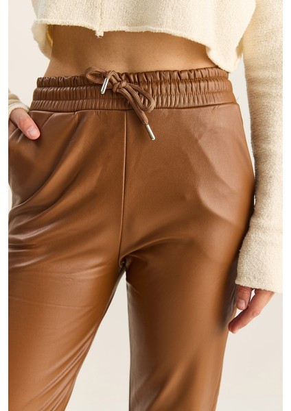 Kadın Içi Kürklü Paça ve Bel Lastikli Cep Detaylı Suni Deri Pantolon indirimleri