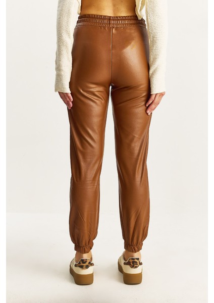 Kadın Içi Kürklü Paça ve Bel Lastikli Cep Detaylı Suni Deri Pantolon