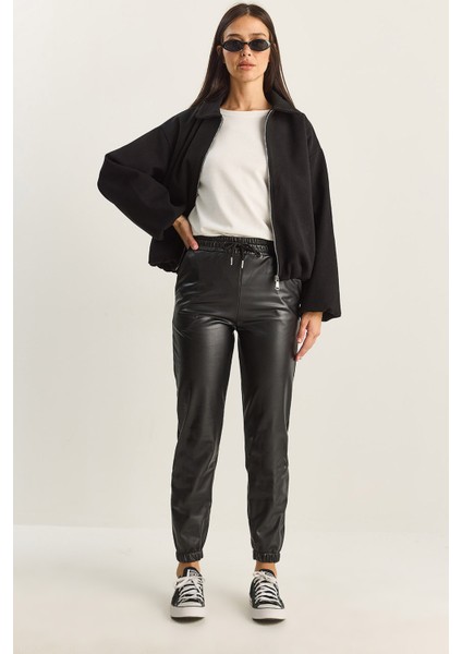 Kadın Içi Kürklü Paça ve Bel Lastikli Cep Detaylı Suni Deri Pantolon fiyatları