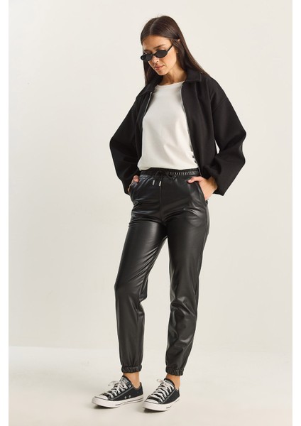 Kadın Içi Kürklü Paça ve Bel Lastikli Cep Detaylı Suni Deri Pantolon modelleri