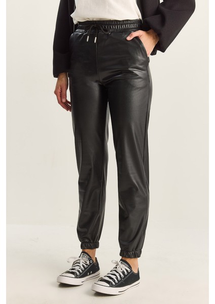 Kadın Içi Kürklü Paça ve Bel Lastikli Cep Detaylı Suni Deri Pantolon indirimleri