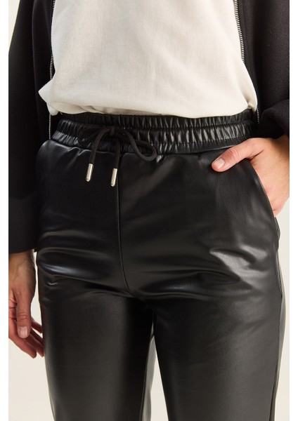 Kadın Içi Kürklü Paça ve Bel Lastikli Cep Detaylı Suni Deri Pantolon