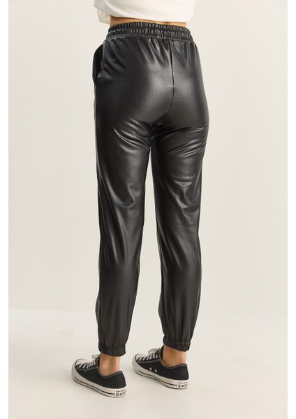 Kadın Içi Kürklü Paça ve Bel Lastikli Cep Detaylı Suni Deri Pantolon