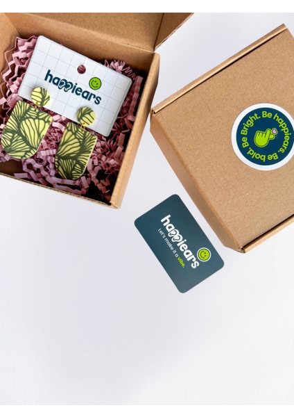 Krem Zemin Üzerine Yeşil Doğal Desenli Özel Tasarım Küpe fırsatları