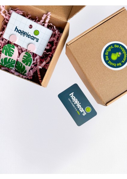 Pembe Zemin Üzerine Yeşil Tropikal Yaprak Desenli Özel Tasarım Küpe fırsatları