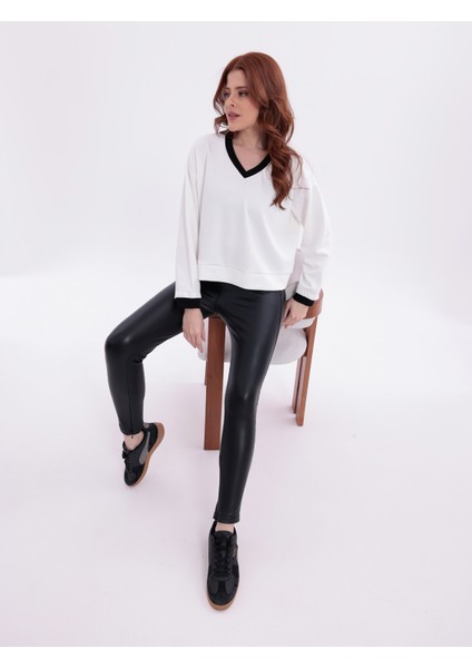 Ekru V Yaka Siyah Garnili Oversize Crop Üst fiyatları