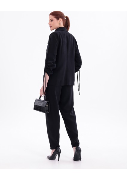 Siyah Ipek Görünümlü Kolları Büzgü Yanlı Ceket, Yüksek Bel Dar Kalıp Pantolon ve Crop Top Üçlü Takım fiyatları