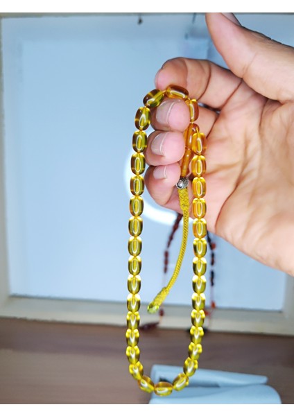 Bakır Kazaz Püsküllü Sıkma ve Ateş Kehribarı fırsatları