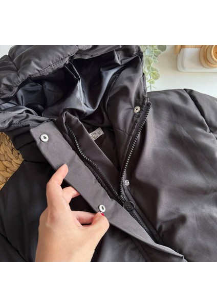 Unisex Model Kapüşon Detaylı Su Geçirmez Çocuk Şişme Montu indirimleri