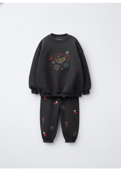 Unisex Çocuk Pamuklu Siyah Yılbaşı Figürlü Eşofman Takımı – Rahat Kesim fırsatları