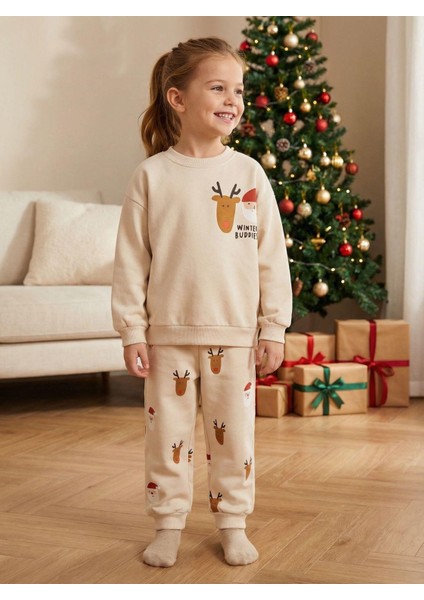 Unisex Çocuk Pamuklu Krem Yılbaşı Figürlü Eşofman Takımı – Rahat Kesim modelleri
