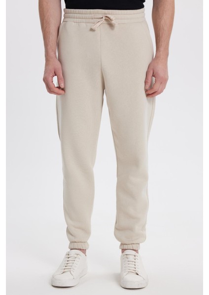 Erkek Slim Fit Dar Kesim Beli Bağcıklı 3 Cepli Geniş Paça Kemik Eşofman Altı