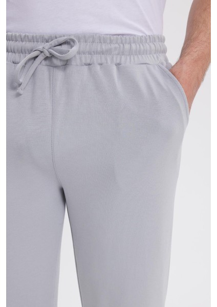 Erkek Slim Fit Dar Kesim Beli Bağcıklı 3 Cepli Geniş Paça Gri Eşofman Altı modelleri