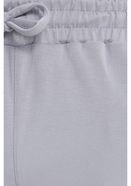 Erkek Slim Fit Dar Kesim Beli Bağcıklı 3 Cepli Geniş Paça Gri Eşofman Altı