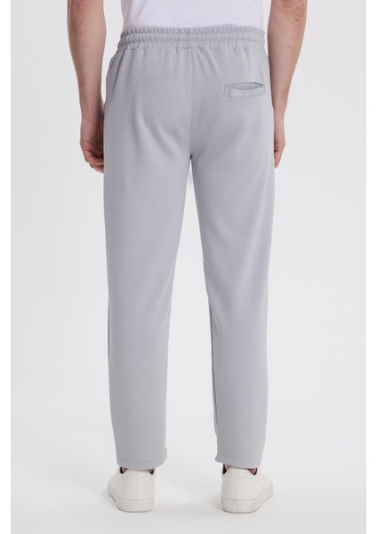 Erkek Slim Fit Dar Kesim Beli Bağcıklı 3 Cepli Geniş Paça Gri Eşofman Altı