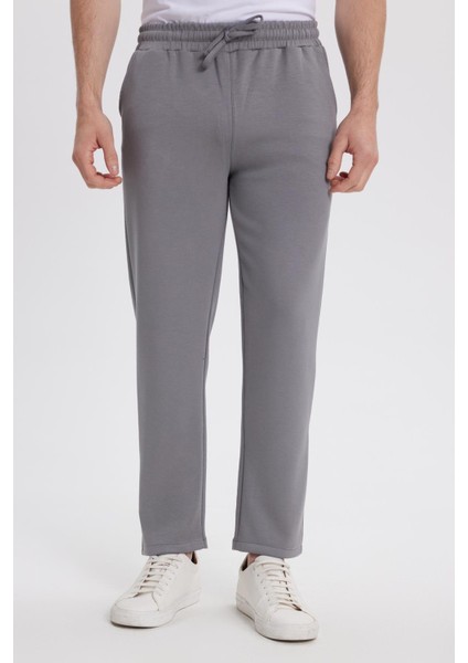 Erkek Slim Fit Dar Kesim Beli Bağcıklı 3 Cepli Geniş Paça Açık Füme Eşofman Altı