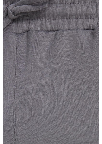 Erkek Slim Fit Dar Kesim Beli Bağcıklı 3 Cepli Geniş Paça Açık Füme Eşofman Altı