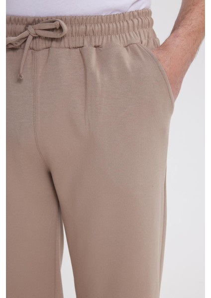 Erkek Slim Fit Dar Kesim Beli Bağcıklı 3 Cepli Geniş Paça Koyu Vizon Eşofman Altı modelleri