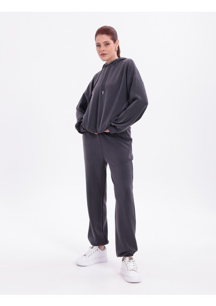 Esnek Rahat Kumaş Kapüşonlu Üst,alt Eşofman Bilekleri Lastikli ve Cepli Ikili Alt Üst Takım K. Gri fiyatları