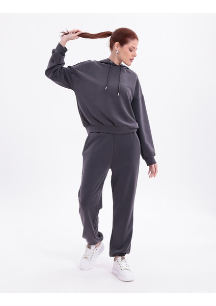 Esnek Rahat Kumaş Kapüşonlu Üst,alt Eşofman Bilekleri Lastikli ve Cepli Ikili Alt Üst Takım K. Gri