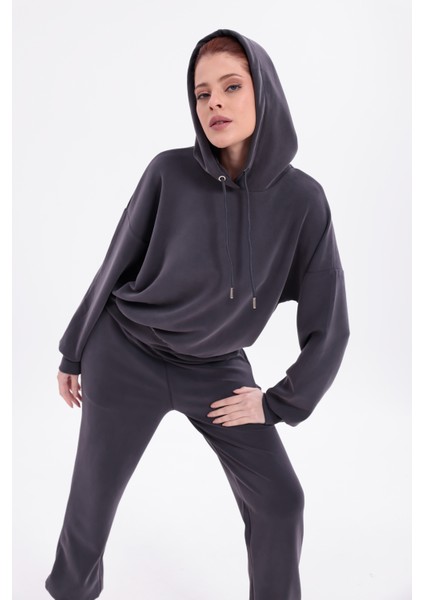 Esnek Rahat Kumaş Kapüşonlu Üst,alt Eşofman Bilekleri Lastikli ve Cepli Ikili Alt Üst Takım K. Gri