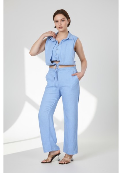 Kadın Bebe Mavisi Keten Ikili Takım – Düğmeli Crop Üst ve Lastikli Bol Paça Pantolon - Mavi indirimleri