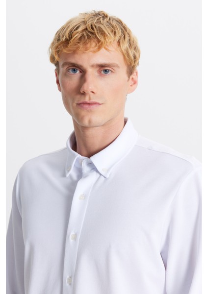 Pamuklu Tailored Slim Fit Dar Kesim Düğmeli Yaka Örme Gömlek fırsatları