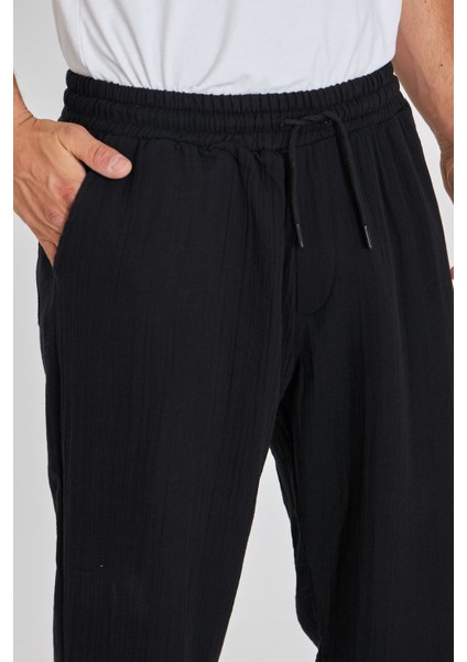 Erkek Baggy Müslin Keten Bel Bağcıklı Lastikli Düz Paça Pantolon fiyatları
