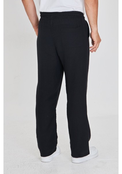 Erkek Baggy Müslin Keten Bel Bağcıklı Lastikli Düz Paça Pantolon fırsatları