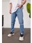 5101 Dizi Yırtık Slim Mavi Jean 1