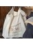 10. Yıl Özel Sınırlı Üretim Bej Shopper Çanta - Katlanabilir, Su Geçirmez, Pratik Tasarım 3