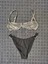 Kadın Parlak Yeşil Üst Arkadan Popçalı, Siyah Alt Yandan Halkalı Üçgen Bikini. 1