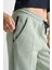 Sportswear Tech Fleece Standart Fit Mid Rise Jogger Kadın Eşofman Altı Su Yeşili 4