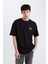 %100 Pamuk Looney Tunes Boxy Fit Bisiklet Yaka Sırt Baskılı Kısa Kollu Tişört E0328AX25SP 4