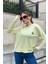 Kadın Fıstık Yeşil Uzun Kol, Yırtmaç Detaylı, Arma ve Yazı Detaylı, Kapüşonlu Sweatshirt Bluz 4