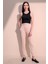 Kadın Bej Rahat Dokulu Kumaş Cepli Beli Lastikli Paça Jogger Spor Pantolon 1
