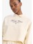 DeFacto Fit Oversize Geniş Kalıp Polo Yaka Slogan Baskılı Sporcu Sweatshirt D7133AX25SP 1