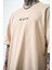 Erkek They Eyes Chico They Never Lie Baskılı Oversize T-Shirt Bej 5