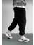 Rahat Kesim Günlük Giyim Için Ideal Paça Lastikli Unisex Siyah Eşorfman Altı 1