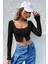 Kadın Siyah Uzun Kollu Agraflı Göğüs ve Göbek Dekolteli Crop Top Bluz 4