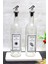 Şeffaf 2’li mermer detaylı 750 ml yağdanlık seti, bej renk, 4+ parça 1