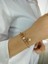 Rose Gold Renkli Yıldız Charm Detaylı Ortası Parlak Taşlı Şık Zarif Kadın Çelik Bileklik 1